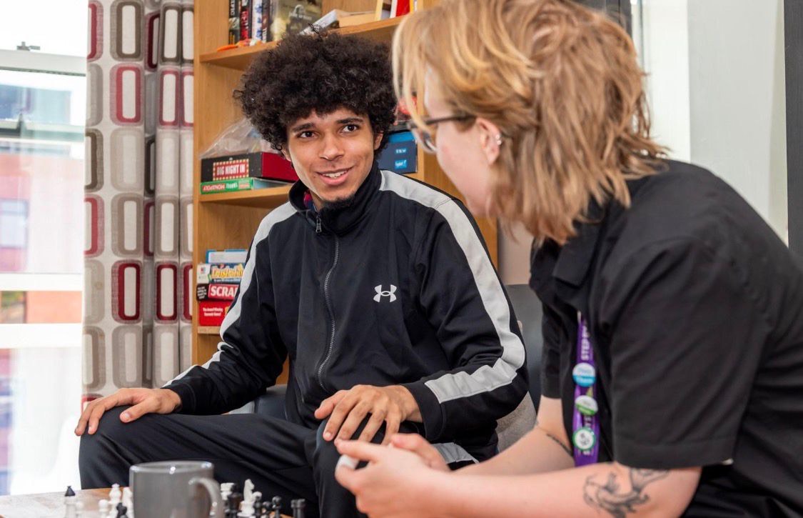 Two people discussing chess game